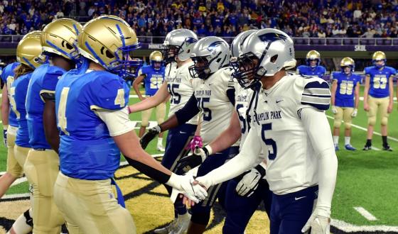 Football players shaking hands.