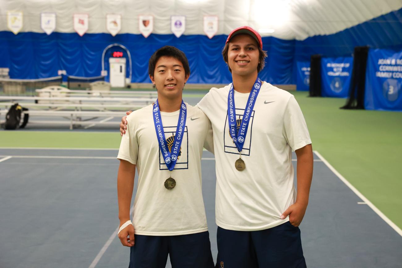 Allan Wang and Isaak Senaratna of St. Paul Academy pose with their gold medals
