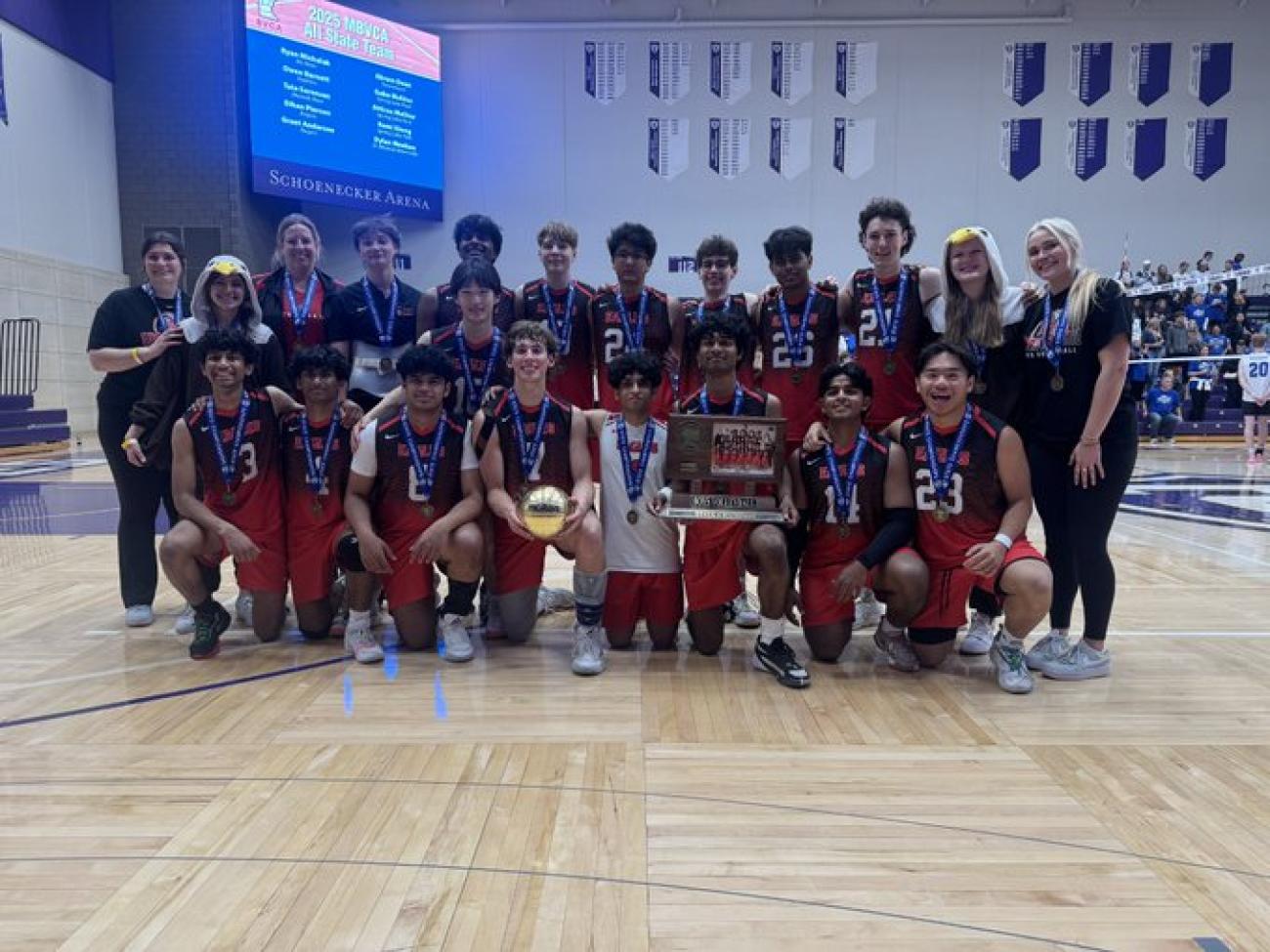 Eden Prairie Boys Volleyball team with first-place trophy