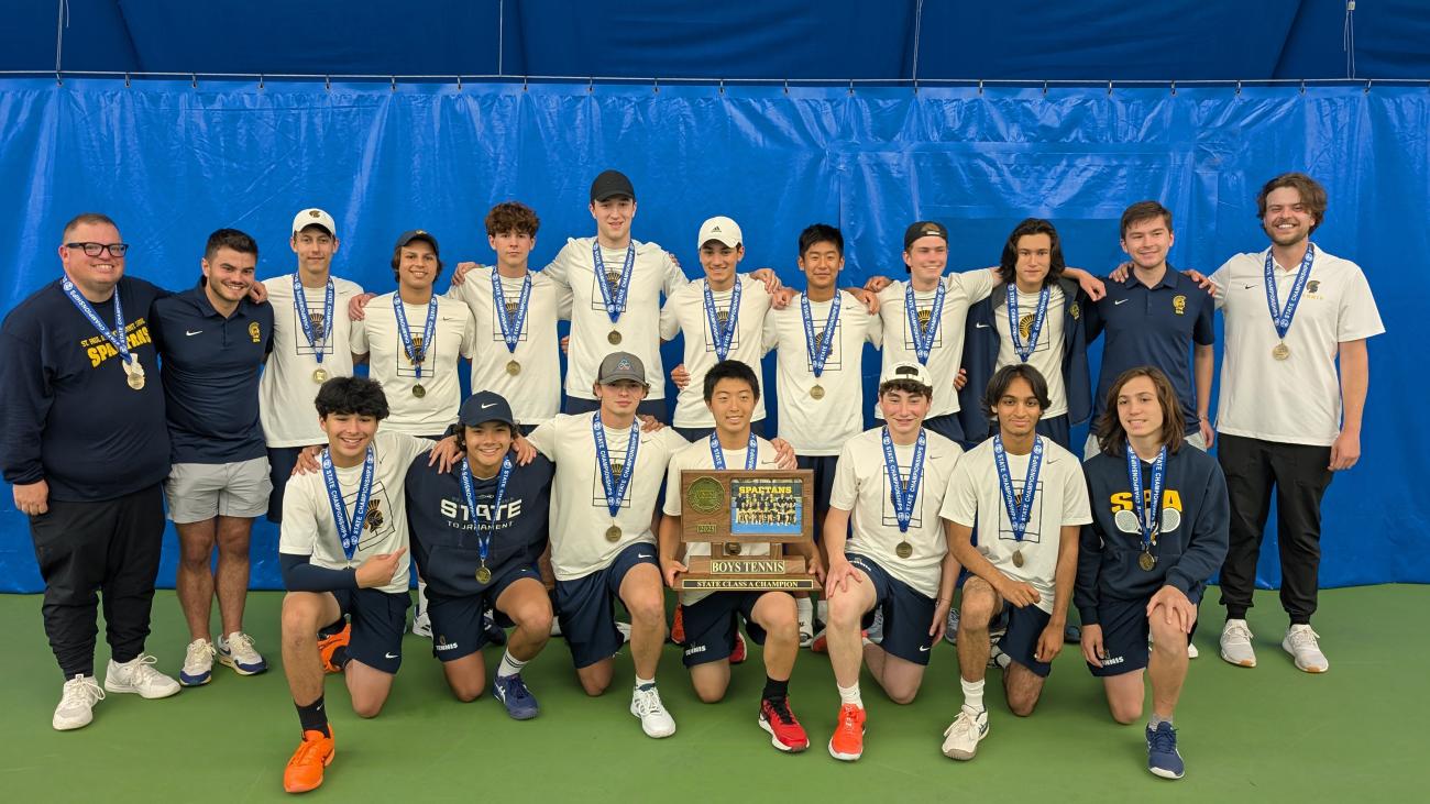 St. Paul Academy and Summit School Boys Tennis team poses with 2025 Boys Tennis State Tournament Class A championship trophy