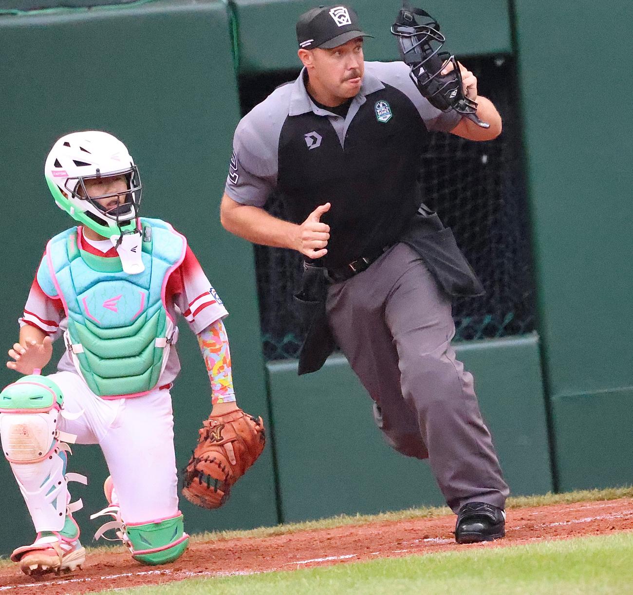 Dwight Stephens makes a call in front of home plate during the 2025 Little League Baseball World Series.