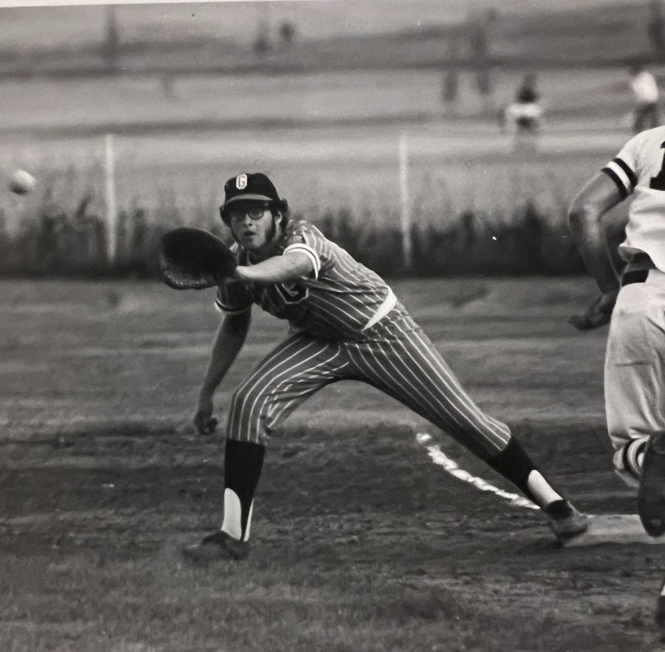 John Millea prepares to catch a baseball while manning first base during a high school game in the 1970s.