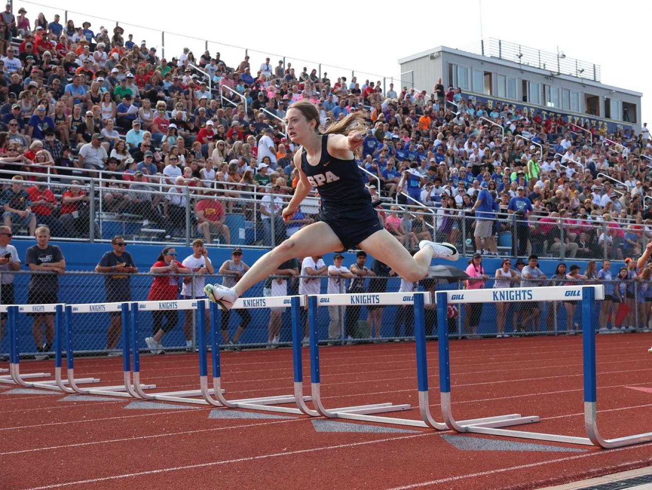 2025 Elizabeth Tuttle 300 Hurdles Girls Track Championship Photo